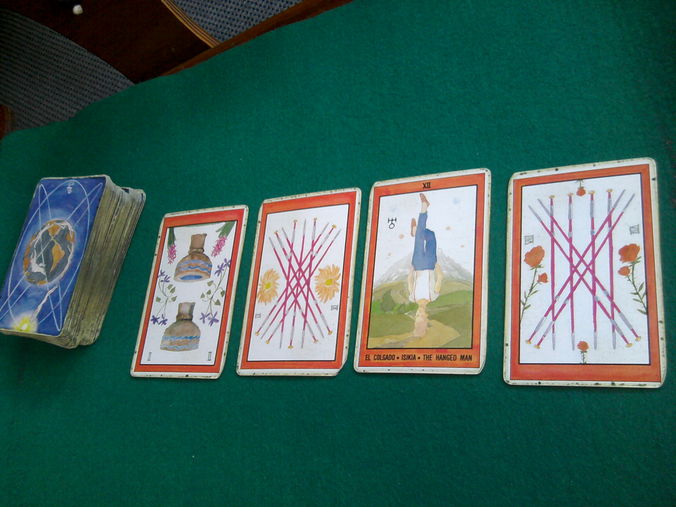 ejemplo de tirada de tarot con 4 cartas